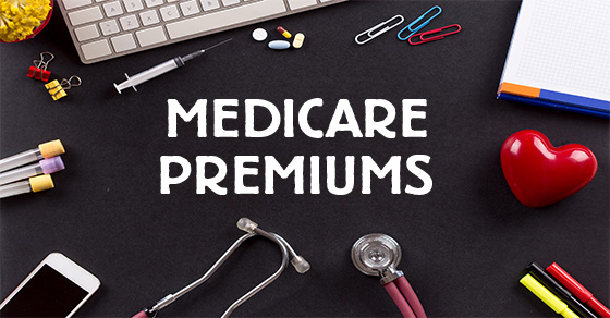 "Medicare Premiums" surrounded by keyboard, stethoscope, prescription