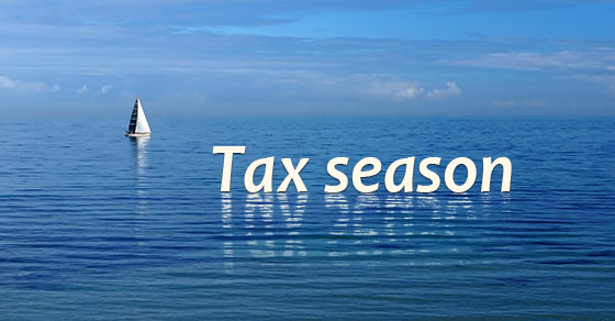 Sail boat on the ocean with Tax Season written across the image