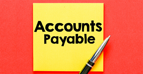 red beckground with yellow post it that says Accounts Payable